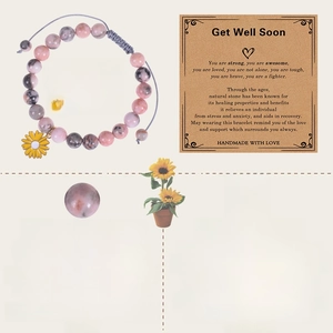 Adjustable natural stone bead bracelet with pink crystals and a sunflower pendant