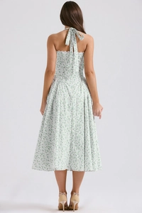 Detail of the tie-up halter neckline and back lace trim on floral summer dress