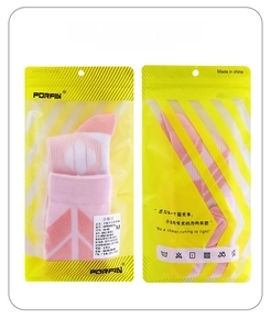 Detailed packaging view of striped Merino wool ski socks in a yellow branded PE bag