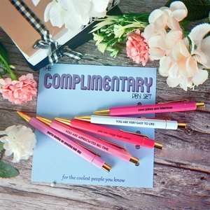 Close-up of nurse-themed 5-piece ballpoint pen set with motivational English quotes