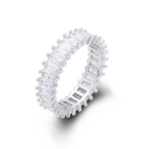 Close-up of eternity band featuring rectangular-cut zircons in claw setting