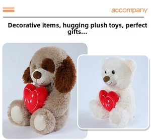 Close-up of brown and white teddy bears holding red plush hearts with Love embroidery