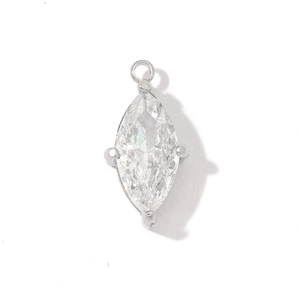 Macro detail of marquise-cut clear zircon pendant in silver stainless steel setting