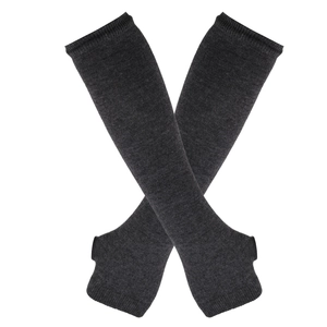 Detailed close-up of dark grey knitted long fingerless arm warmers in a crossed layout