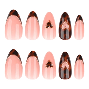 French leopard tortoise shell press-on nails with 3D hearts on almond-shaped tips