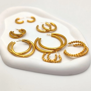 Set of 6 gold plated stainless steel hoop earrings in various sizes and textures