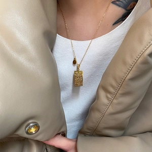 Gold stainless steel Libra zodiac necklace featuring a rectangular tarot pendant for women