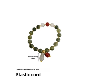 Detail of beaded dog charm bracelet with green beads and 1.5cm gourd pendant