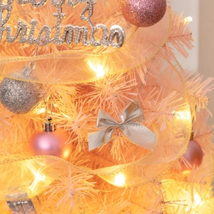 Detail of 55cm mini Christmas tree with warm LED lights and silver bow ornaments