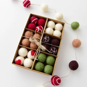 24-piece Christmas wool felt ball set in kraft box with festive embroidery patterns