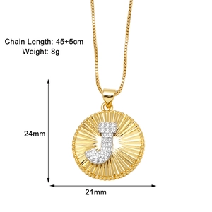 Detail view of gold letter J pendant necklace showing dimensions 24mm by 21mm and sunray texture
