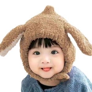 Plush brown baby winter hat with cute bunny ears and ear protection for infant warmth