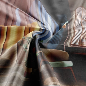 Detailed macro view of bohemian tapestry fabric showing high-end printing and silky texture