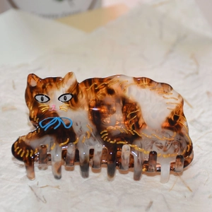 Pince à cheveux chat mignonne en acétate avec nœud bleu et motif écaille de tortue