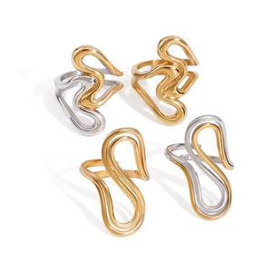 Minimalist wave design stainless steel rings in gold and silver finish on white background
