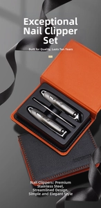 Detailed view of 3-piece stainless steel manicure set in orange and black leather case