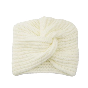 Close-up of white knit turban hat featuring detailed cable stitch and ribbed texture