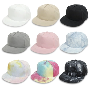 Collection of kids flat brim hip hop caps featuring solid colors and marble tie-dye patterns