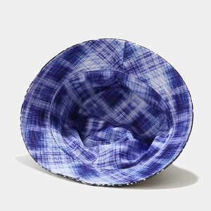 Detail view of the stitching and interior of the blue and purple checkered bucket hat