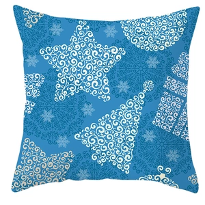 Detailed pattern of blue Christmas pillow cover with white festive tree and golden stars