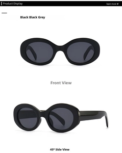 Detail view of oval marble pattern sunglasses with black frames and grey lenses