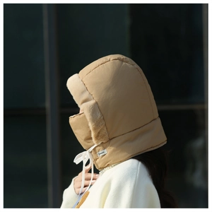 Detail of khaki windproof trapper hat with warm faux fur lining and integrated face mask