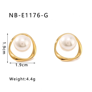 Detail view of gold pearl stud earrings with 1.9cm dimensions and weight specifications