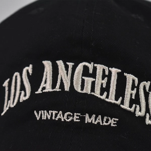 Black cotton baseball cap featuring white Los Angeles Vintage Made 3D embroidery detail