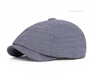 Detailed texture of navy blue cotton linen fabric on a vintage newsboy flat cap