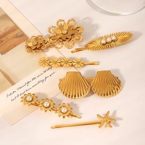 Détail du lot de 6 barrettes dorées 18K avec perles et motifs floraux et marins