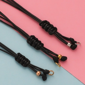 Bracelet ajustable en cordon de cire tressé noir avec perles métalliques de trois couleurs