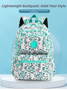 Detail of floral printed oxford backpack featuring large capacity compartments and straps