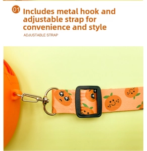 Detail of adjustable strap and metal hook for the orange silicone cartoon bag