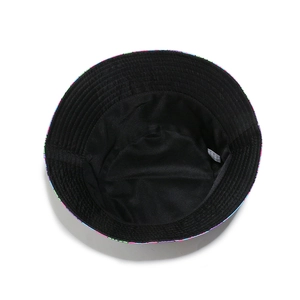 Detail view of fisherman hat interior featuring premium black fabric and wash care label