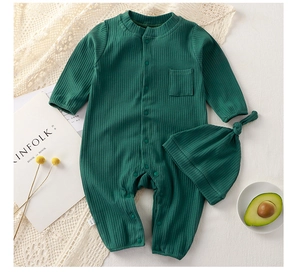 Flat lay of ribbed cotton long-sleeve baby bodysuit set with matching knotted hat and pocket