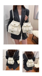 Quilted white leather backpacks in two sizes showing chain straps and gold twist-lock detail