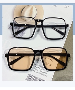 Detailed top view of trendy square half-rim sunglasses with tinted and clear lenses