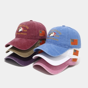 Detail showing various colors of embroidered 250th anniversary hats in vintage washed cotton
