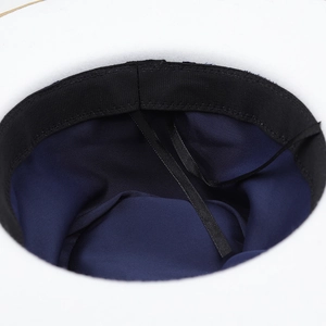 Interior view of wool fedora hat featuring silk lining and adjustable sweatband