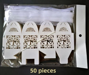 Pack of 50 laser-cut white favor boxes featuring birdcage patterns and ribbons