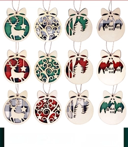 12-piece set of wooden Christmas ornaments featuring reindeer and forest cutout patterns