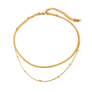 Minimalist double layer gold necklace featuring a wide snake chain and beaded ball chain