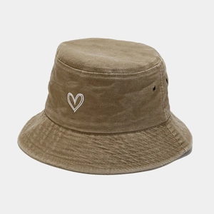 Retro washed cotton bucket hat in khaki with white heart embroidery and metal eyelets