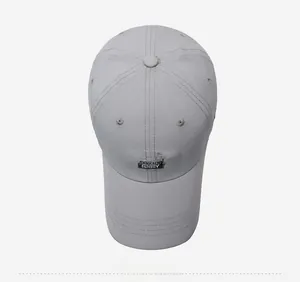 Top view of a light gray quick-dry baseball cap featuring black COLLECT HOBBY embroidery