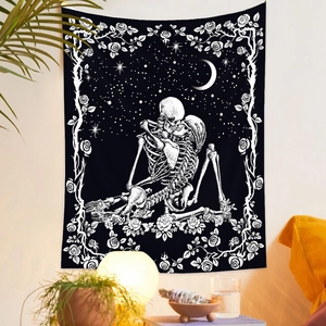 Detail of gothic skeleton lovers tapestry with roses and crescent moon on white wall