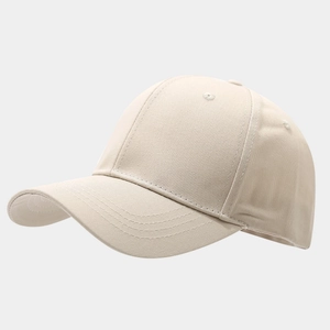 Detail of premium cotton baseball cap with embroidered eyelets and minimalist curved brim