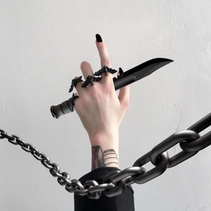 Gothic black bat wing rings set for men and women featuring dark punk aesthetic style