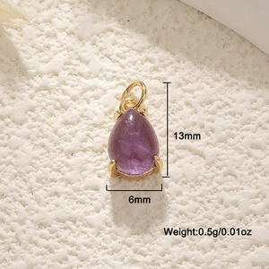 Macro shot of 13mm purple teardrop stone pendant with 18K gold plated frame and ring