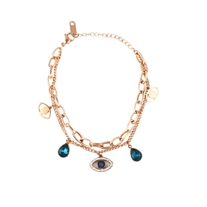 Rose gold layered evil eye bracelet with blue teardrop stones and k18 engraving