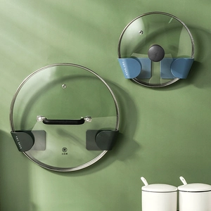 Wall-mounted drill-free pot lid rack in navy and black for kitchen space saving